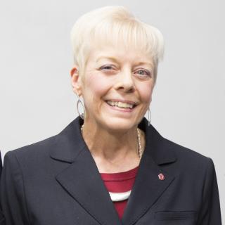 Janey Weisenberger in a suit